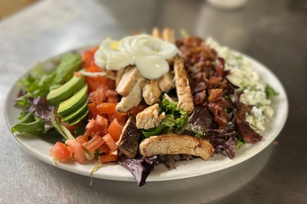 Back Porch Bar & Grill Satisfying Cobb Salad with grilled chicken hard-boiled egg bacon bleu cheese avocado